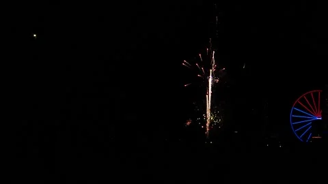 Fireworks display at a funfair at night Stock Footage 157306770