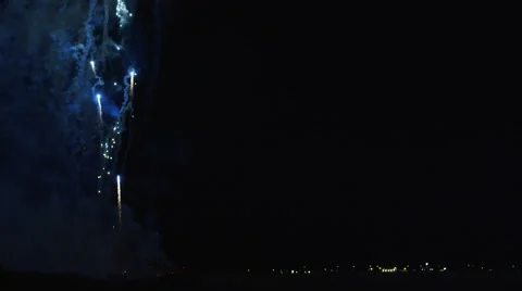 Fireworks display with ground mortars discharging multiple rockets at left of Stock Footage 59162164