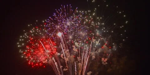 Fireworks Display Over the City During New Year Celebration at Midnight Stock Footage 341436288
