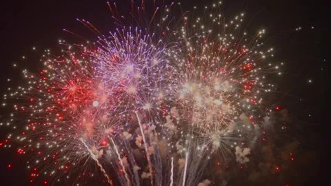 Fireworks Display Over the City During New Year Celebration at Midnight Stock Footage 341437544