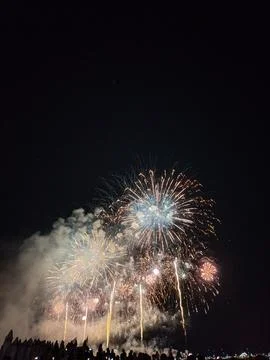Fireworks display over crowd at 22 July in Cannes, France Stock Photos