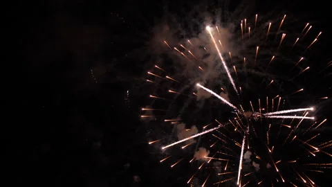 Fireworks draw amazing pattern of sparkling blasts in black night sky Stock Footage 258080721