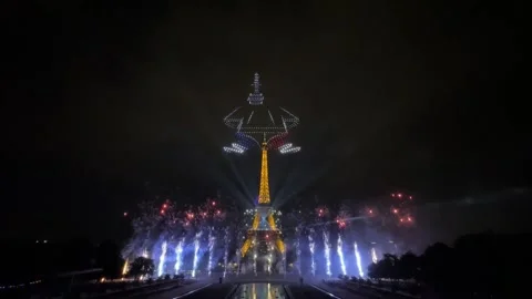 Fireworks, drones light up Paris ahead of Bastille Day, París, FR - 14 Jul 2026 Stock Footage 339516636