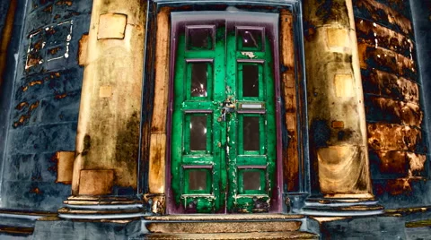 Fireworks explode behind old weathered green door Video stock 1044082