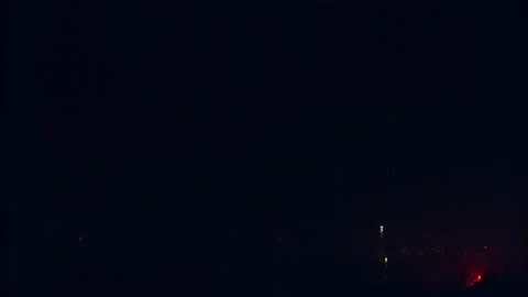 Fireworks Explode Everywhere All Over a Neighborhood and City at Night Stock Footage 201895302