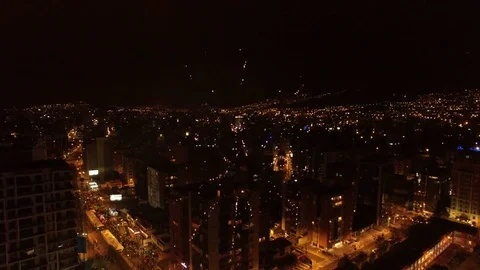 Fireworks Explode in front of City Buildings Stock-Footage 74085541