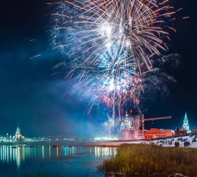 Fireworks explode in a glorious display over the Kokshaga river at Yoshkar-Ol Stock Photos