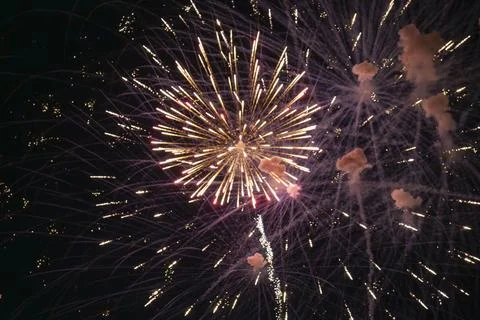 Fireworks Explode at Night Stock Photos