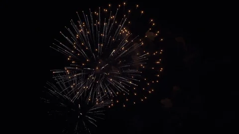 Fireworks explode in the night sky Stock Footage 120110718