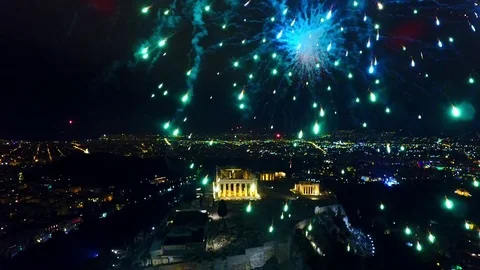 Fireworks explode over the Acropolis during the New Year celebrations in Athens, Stock Footage 71202239