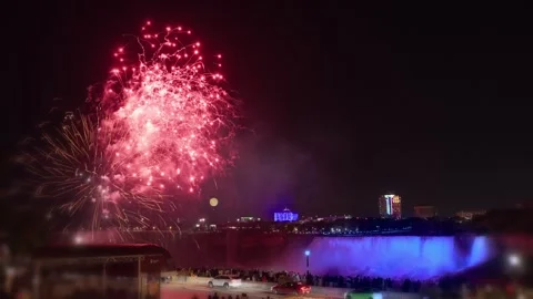 Fireworks explode over the Horseshoe Falls in Niagara Falls Canada Video stock 346359039