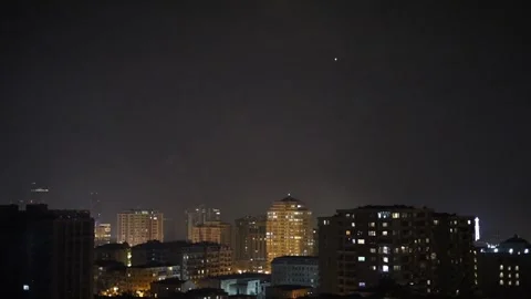 Fireworks exploding against the backdrop of a city Stock Footage 297302456