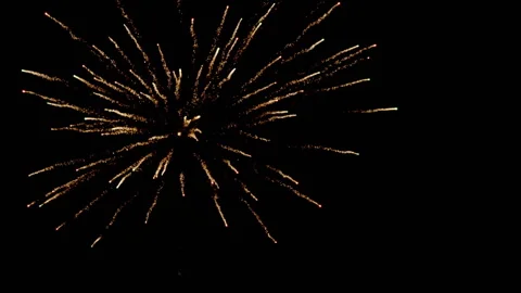 Fireworks exploding against black background Stock Footage 141238371