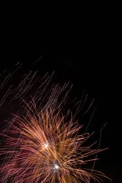 Fireworks exploding against night sky Stock Photos