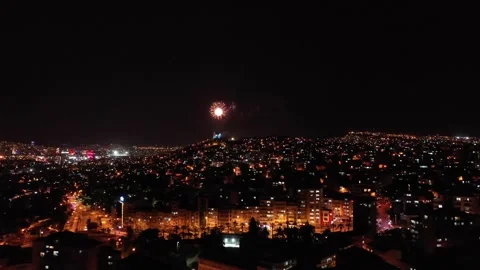 Fireworks exploding for celebration over the city at night, izmir-turkey Stock Footage 292562707
