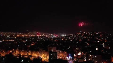 Fireworks exploding for celebration over the city at night, izmir-turkey Stock Footage 292562717