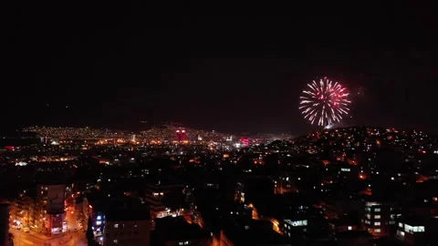 Fireworks exploding for celebration over the city at night, izmir-turkey Stock Footage 292562778