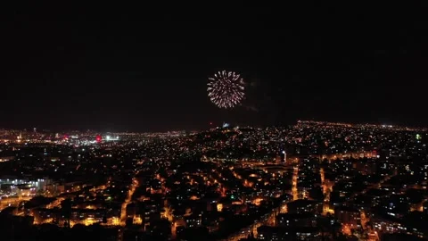 Fireworks exploding for celebration over the city at night, izmir-turkey Stock Footage 292562961