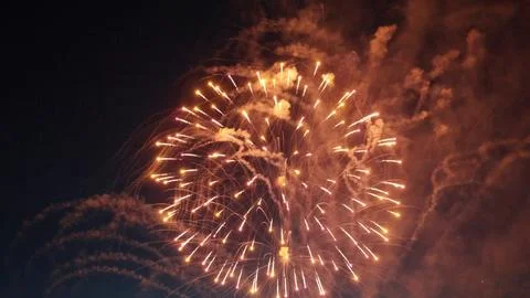 Fireworks exploding creating a spectacular show in the night sky Stock Photos