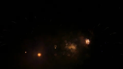 Fireworks exploding in the dark night sky during a celebration Stock-Footage 107260809
