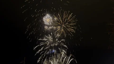 Fireworks exploding in the dark night sky during a celebration Video stock 303019203