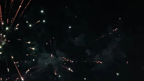 Fireworks Exploding in Dark Night Sky with Smoke Trails Video stock 347745977