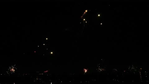 Fireworks Exploding On Evening Sky Over The City. Low Angle Stock Footage 231688586