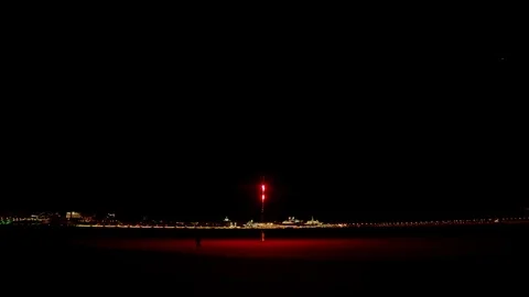 Fireworks exploding late at night outdoors Stock Footage 127373424