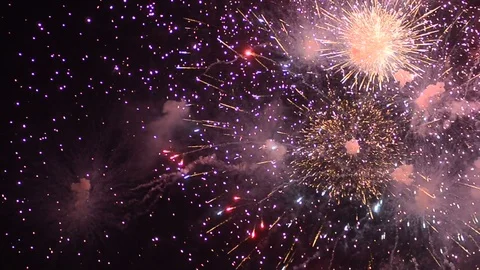 Fireworks exploding to myriads of stars and sparkles Stock Footage 92546965
