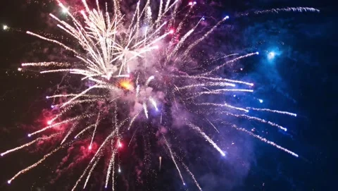Fireworks exploding in the night background Stock Footage 144828508