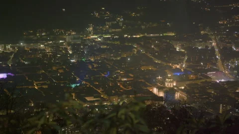 Fireworks exploding night mountain city handheld Stock Footage 336201159
