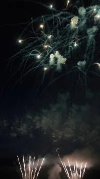 Fireworks exploding in the night sky, creating a mesmerizing spectacle Stock Photos