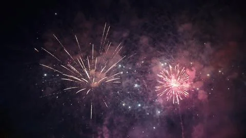 Fireworks exploding in the night sky, creating a colorful spectacle Foto stock