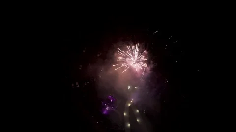 Fireworks exploding in night sky during celebration Stock Footage 327427814