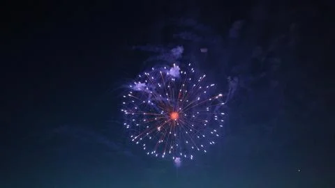 Fireworks exploding in the night sky during a celebration Stock Photos