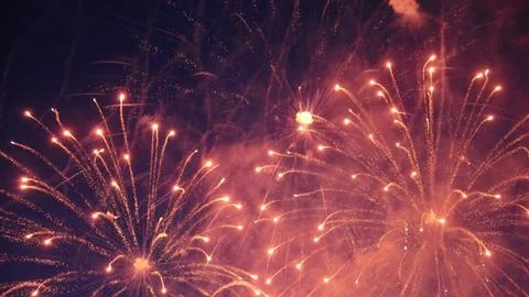 Fireworks exploding in the night sky during a celebration Stock Photos