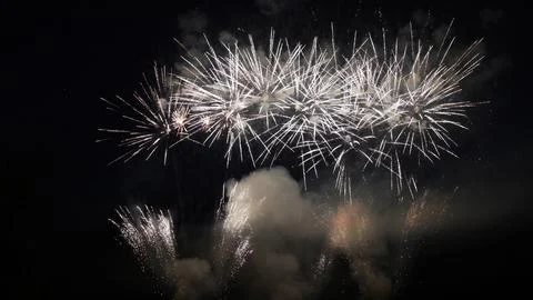 Fireworks exploding in the night sky during a celebration Stock Photos