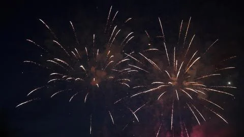 Fireworks exploding in the night sky during a celebration Stock Photos