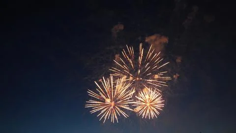 Fireworks exploding in the night sky during a celebration Stock Photos