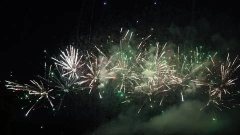 Fireworks exploding in the night sky during a celebration Stock Photos