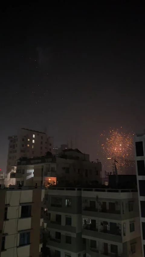Fireworks exploding in the night sky Stock Footage 230150425