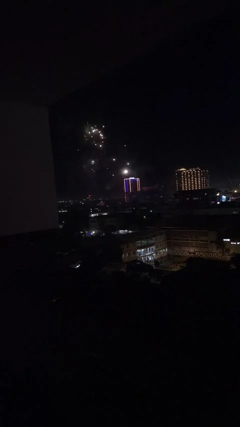 Fireworks exploding in the night sky Stock Footage 325418048