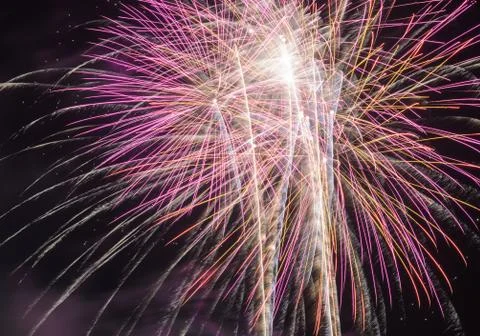 Fireworks exploding in the night sky Stock Photos