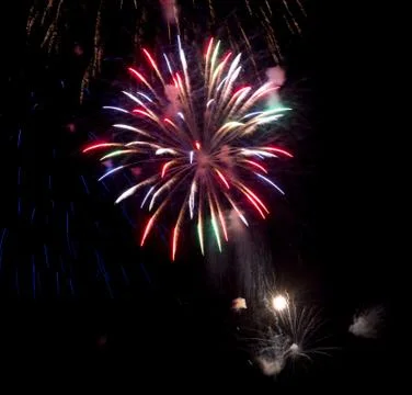 Fireworks exploding in night sky 写真素材