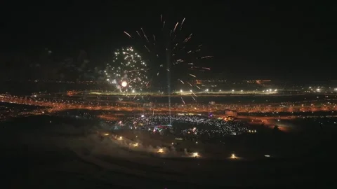 Fireworks exploding over Bahria Town Karachi during New Year's Eve celebration Stock Footage 299700506