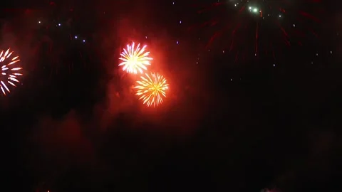 Fireworks Exploding Over Dark Sea at Night Video stock 346221604