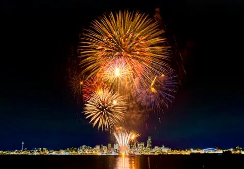 Fireworks exploding over Seattle city skyline, Washington, United States Stock Photos