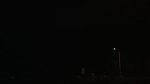 Fireworks Exploding Over Streetlamp Stock Footage 107397585