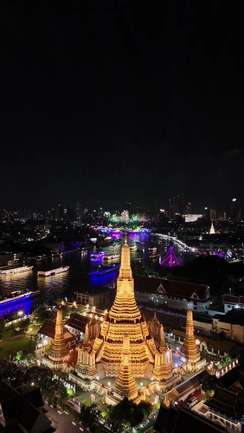 Fireworks Exploding Over Wat Arun Temple in Bangkok, Thailand at Night Stock Footage 335838828