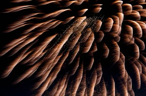 Fireworks exploding in the sky at night Stock Photos